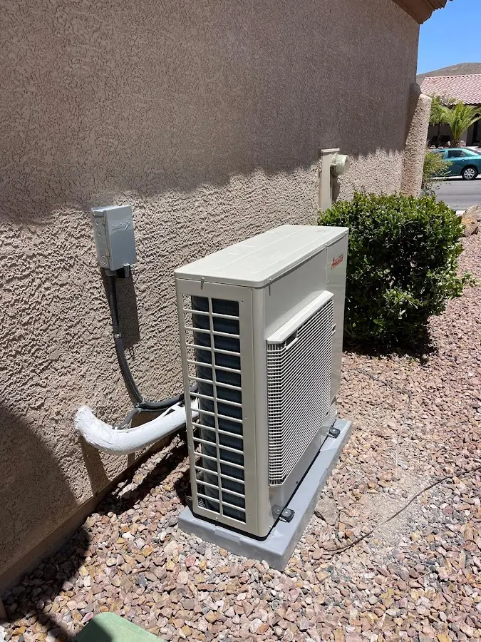 Residential air conditioning condenser unit in La Homa